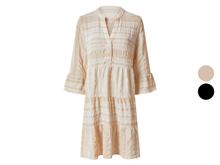 Damesjurk met etnische print in beige en witte tinten, 3/4 mouwen en V-hals.