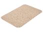 Beige rechthoekige vloermat met afgeronde hoeken.