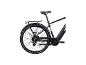 Zwarte elektrische fiets met bagagedrager en tekst 'A PASSION FOR CYCLING SINCE 1921'.