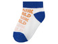 Witte sok met blauwe rand en oranje tekst 'Classic World'.
