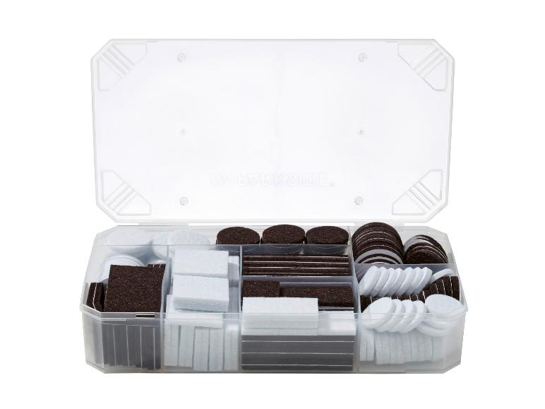 Open opbergdoos met diverse bruine en witte viltjes