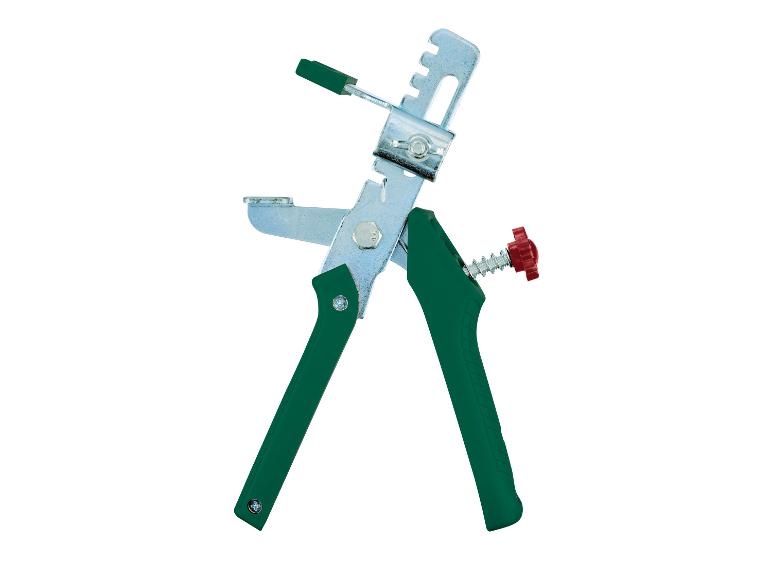 Een groene tegelnipper met een metalen frame.