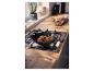 SILVERCREST® Premium gietijzeren grillpan met vlees op het fornuis.