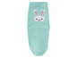 Een paar mintgroene sokken met een konijntje erop.