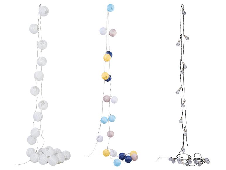 Drie lichtslingers: witte papieren lantaarns, kleurrijke papieren lantaarns en heldere gloeilampen.