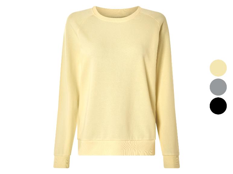 Lichtgele sweater, ook verkrijgbaar in grijs en zwart.