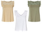 Beige, groene en witte tops met kant en ruches.
