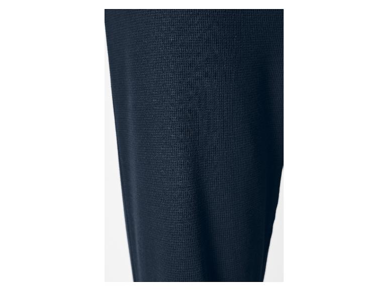 Close-up van donkerblauwe gebreide stof.