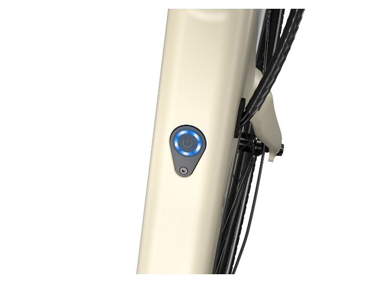 Een close-up van de aan/uit-knop van een elektrische fiets.