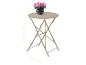 Beige opvouwbare bistrotafel met een pot roze bloemen, afmetingen 70,5x57cm.