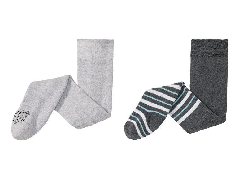 Twee paar meisjeskousen, één met een dierprint en de andere met strepen.