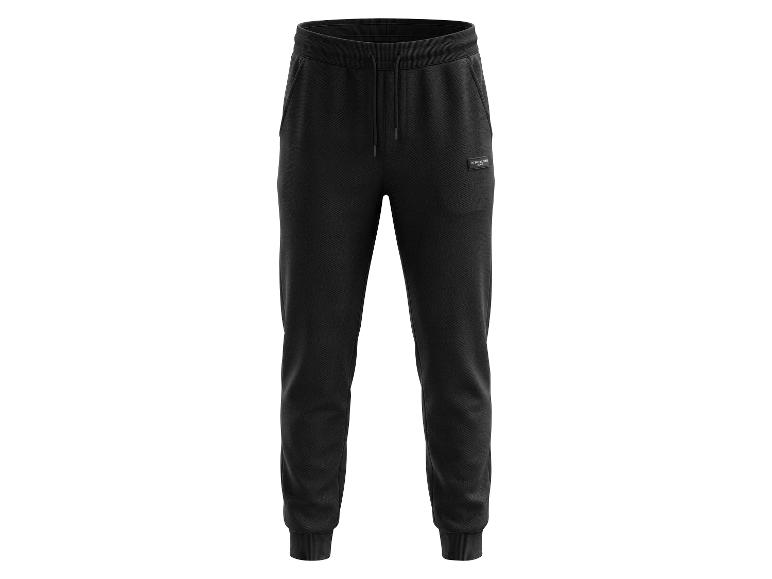 Zwarte joggingbroek voor heren met trekkoord en geribde boorden.