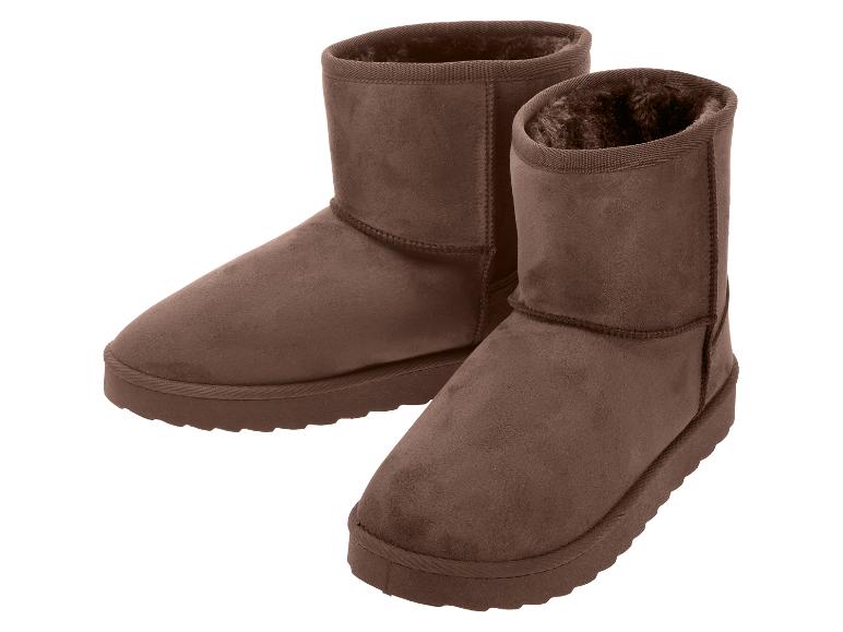 Paar bruine laarzen met bontvoering, ideaal voor de winter.