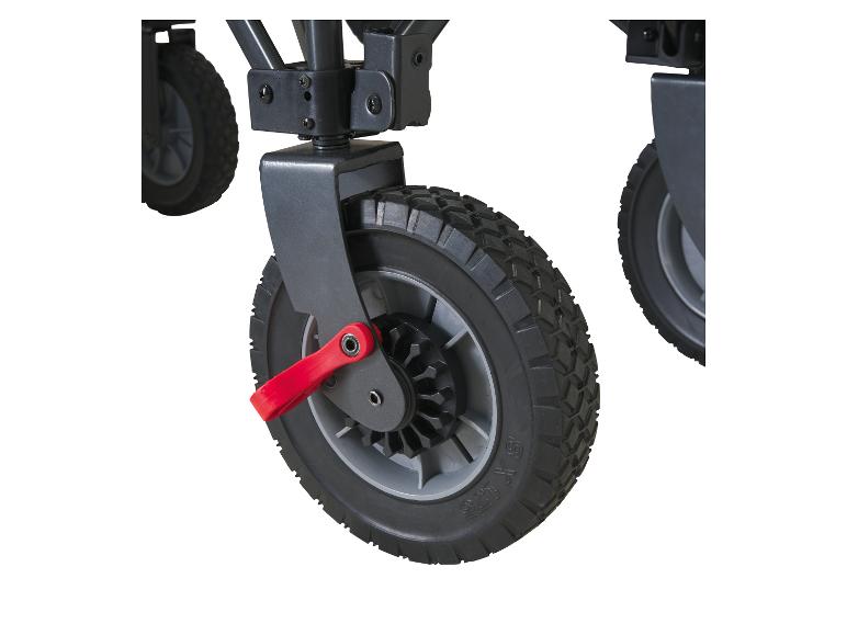 Close-up van een zwart trolleywiel met een rode remhendel