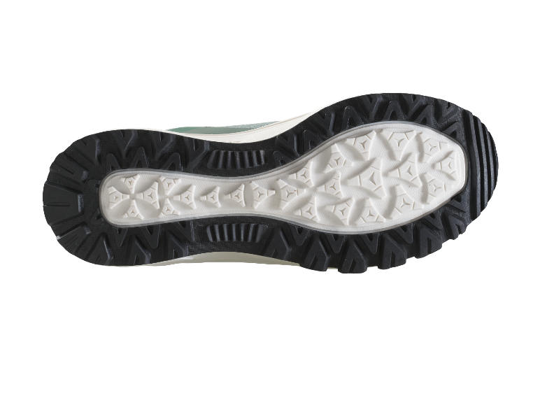 Zool van een groene sportschoen.