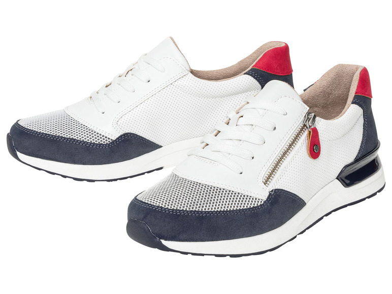 Witte sneakers met blauwe accenten en een rits