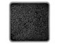 Vierkante doos gevuld met zwart poreus materiaal.