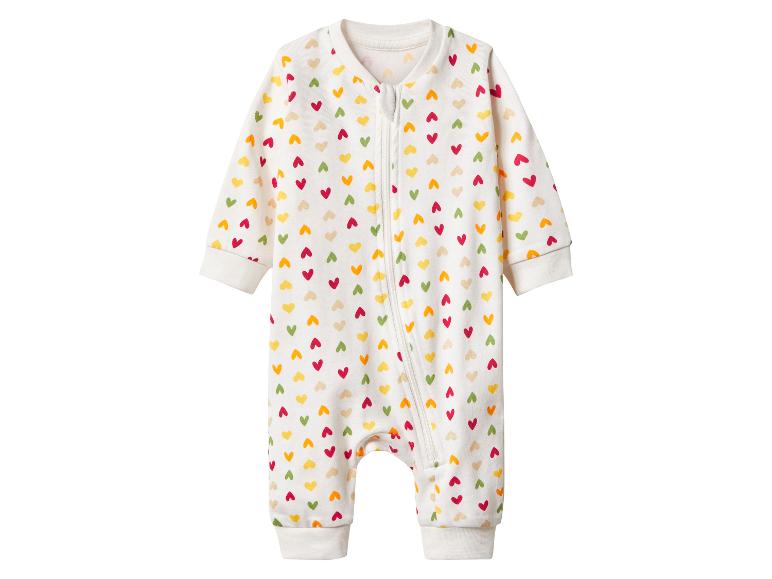 Witte baby romper met kleurrijke hartjes en rits