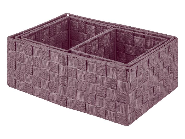 Drie bruine opbergmanden met een gevlochten patroon.