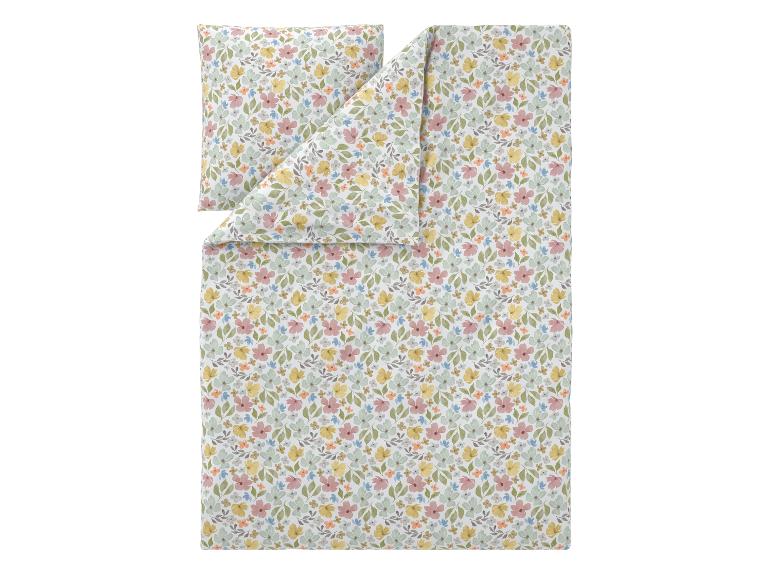 Dekbedovertrekset met pastelkleurig bloemenpatroon.