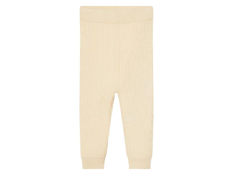 Beige geribbelde gebreide leggings voor baby's.