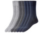 Een set met zes paar sokken, drie donkerblauw en drie grijs.