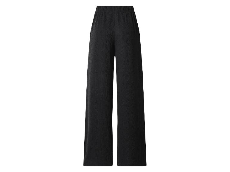 Zwarte, wijde damesbroek met elastische tailleband.