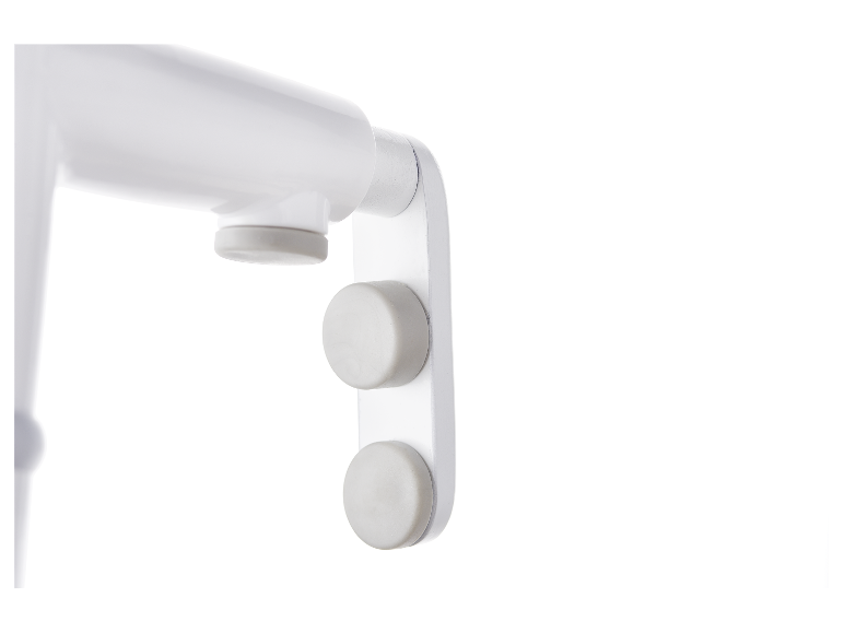 Witte houder met rubberen voetjes.