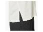 Crèmekleurige blouse met zijsplitten en zwarte broek