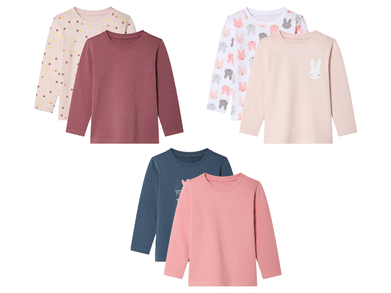 Drie sets langarmige shirts voor kinderen met stippen, konijnen en tekst.