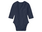 Een donkerblauwe baby romper met lange mouwen.