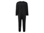 Zwart jumpsuit met lange mouwen.
