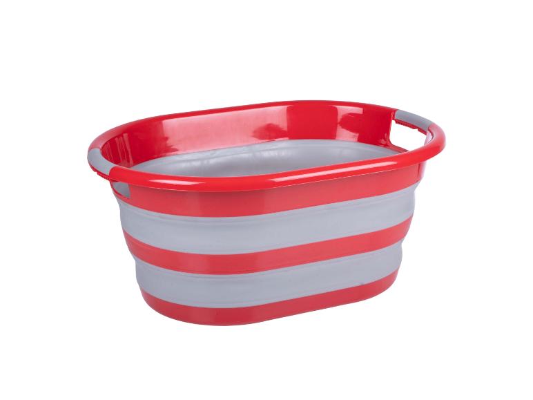 Opvouwbare wasmand in rood en grijs.