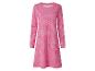 Roze jurk met lange mouwen en witte stippen.