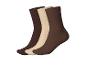 Drie paar sokken in bruine en beige tinten.