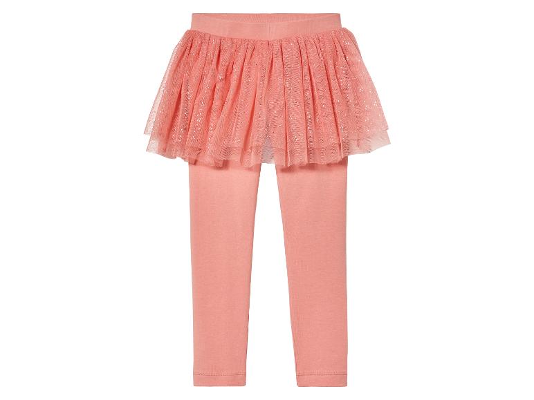 Roze leggings met een glitterende tule rok eroverheen.