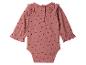 Roze baby romper met hartenprint en ruches