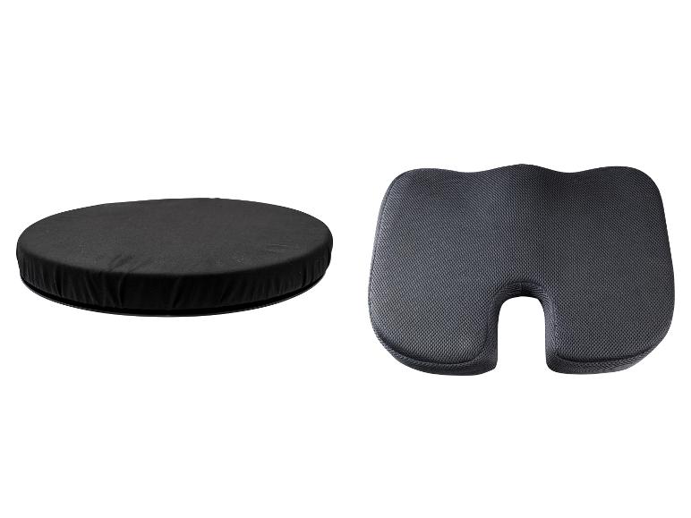 Zwart rond zitkussen en grijs ergonomisch stuitkussen.