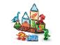 Magnetische tegels set met dinosaurusfiguren, vulkaan, cactus en dinosauruseieren.