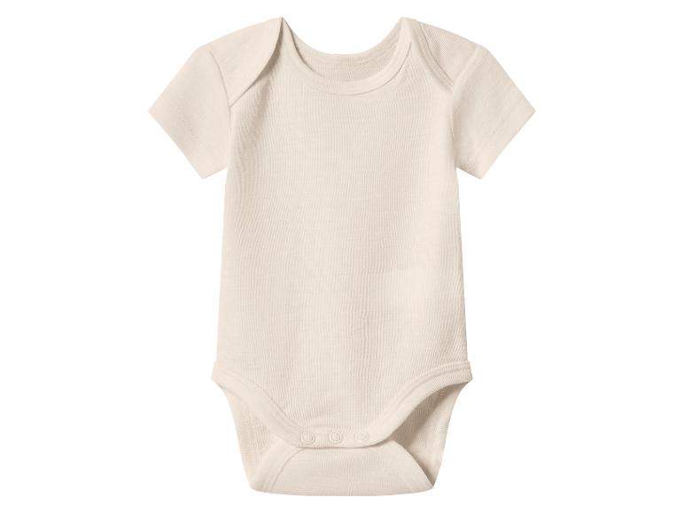 Crèmekleurige baby romper met korte mouwen