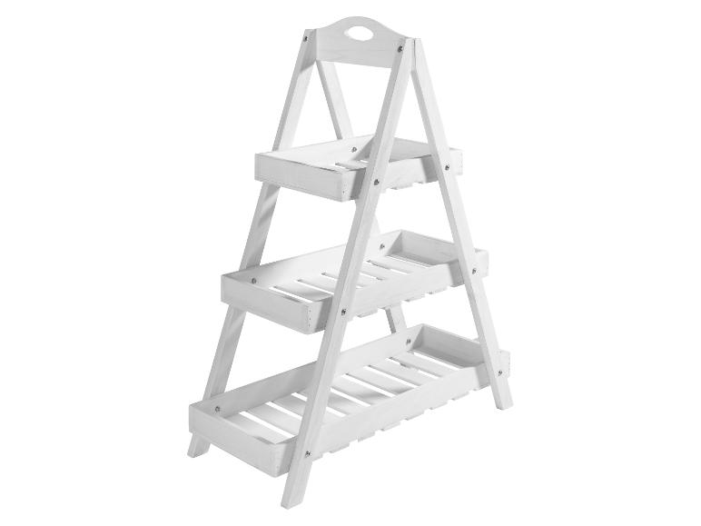 Witte houten drielaagse standaard voor planten of opslag.