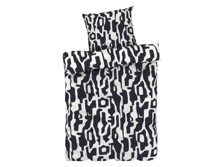 Een zwart-wit beddengoedset met een abstract patroon.