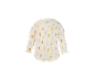 Crèmekleurige babybody met lange mouwen en print van huisjes en bomen.