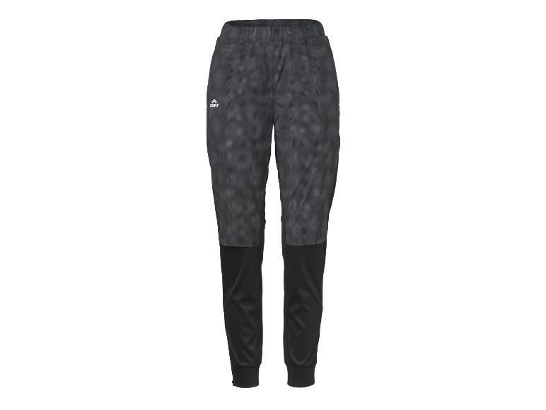 Zwarte en grijze sportbroek met patroon, elastische tailleband en geribde enkels.
