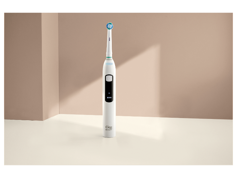 Elektrische tandenborstel Cien Beauty op een wit oppervlak.