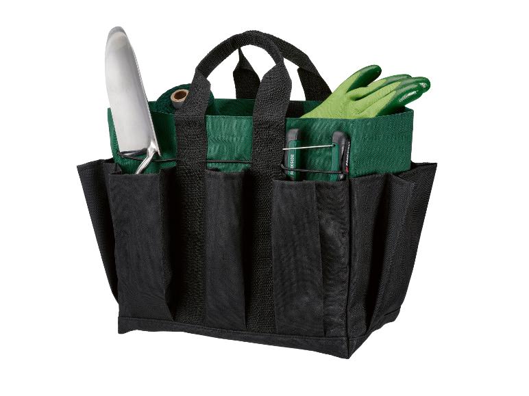 Een groene tuintas met gereedschap, handschoenen en touw.