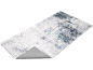 Abstract grijs en wit patroonkleed met opgevouwen hoek
