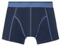 Een paar donkerblauwe boxershorts met een blauwe elastische tailleband.