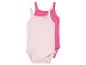 Twee baby rompertjes, lichtroze en fuchsia.