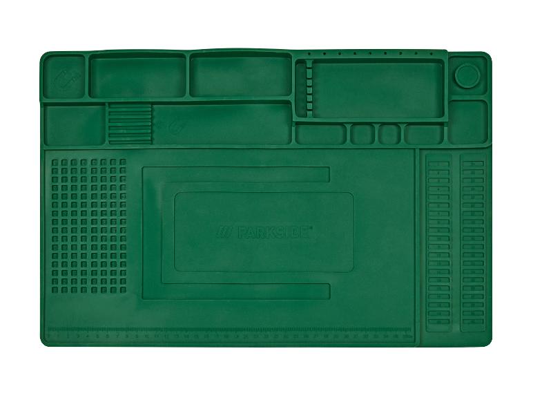 Groene Parkside werkmat met vakken en liniaal.